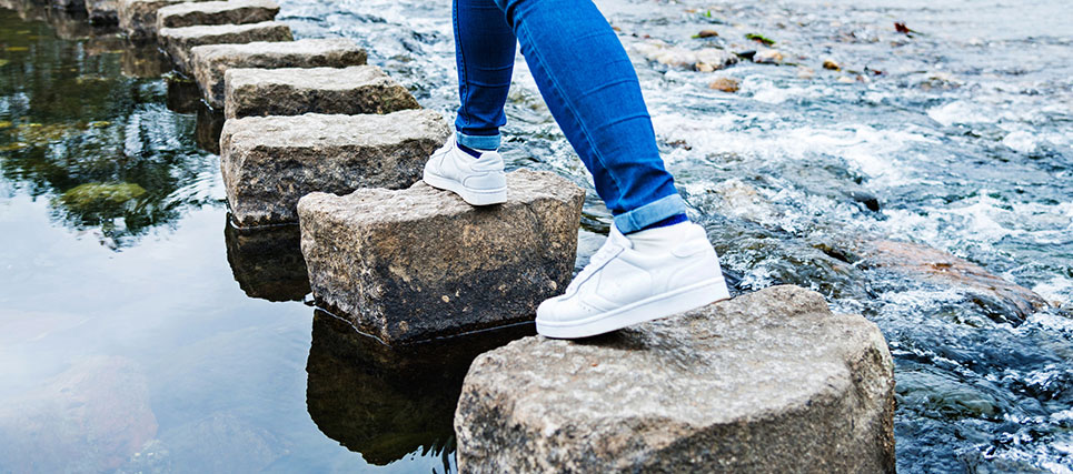 walking on river stepping stones